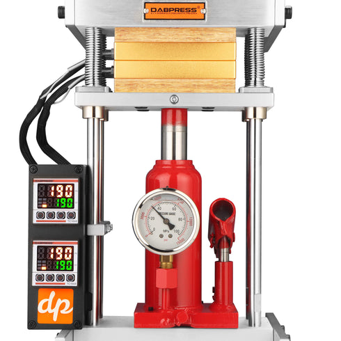 Dabpress Amberigo 4-ton rosin press in operation, extracting rosin onto parchment paper between insulated solid aluminum heating platens.